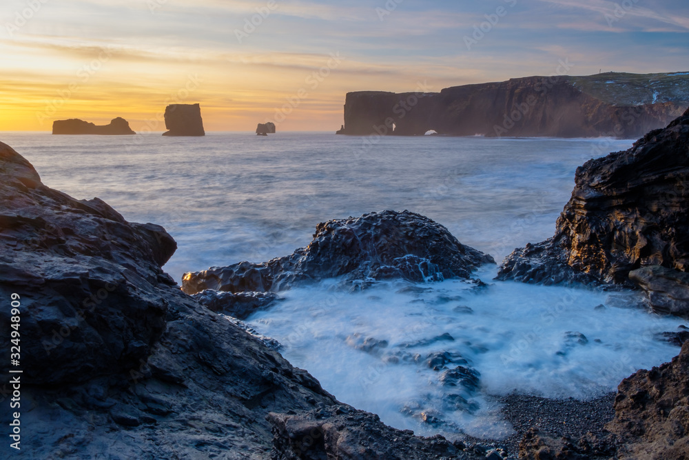 Iceland: spectacular golden hour sunset at Dyrhólaey