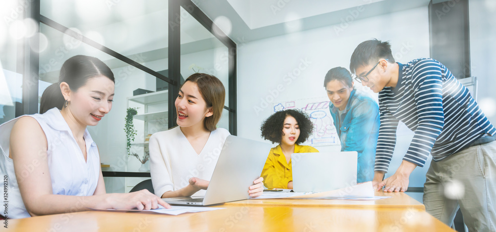 Group of asian young creative happy people entrepreneur on a business meeting office background Good