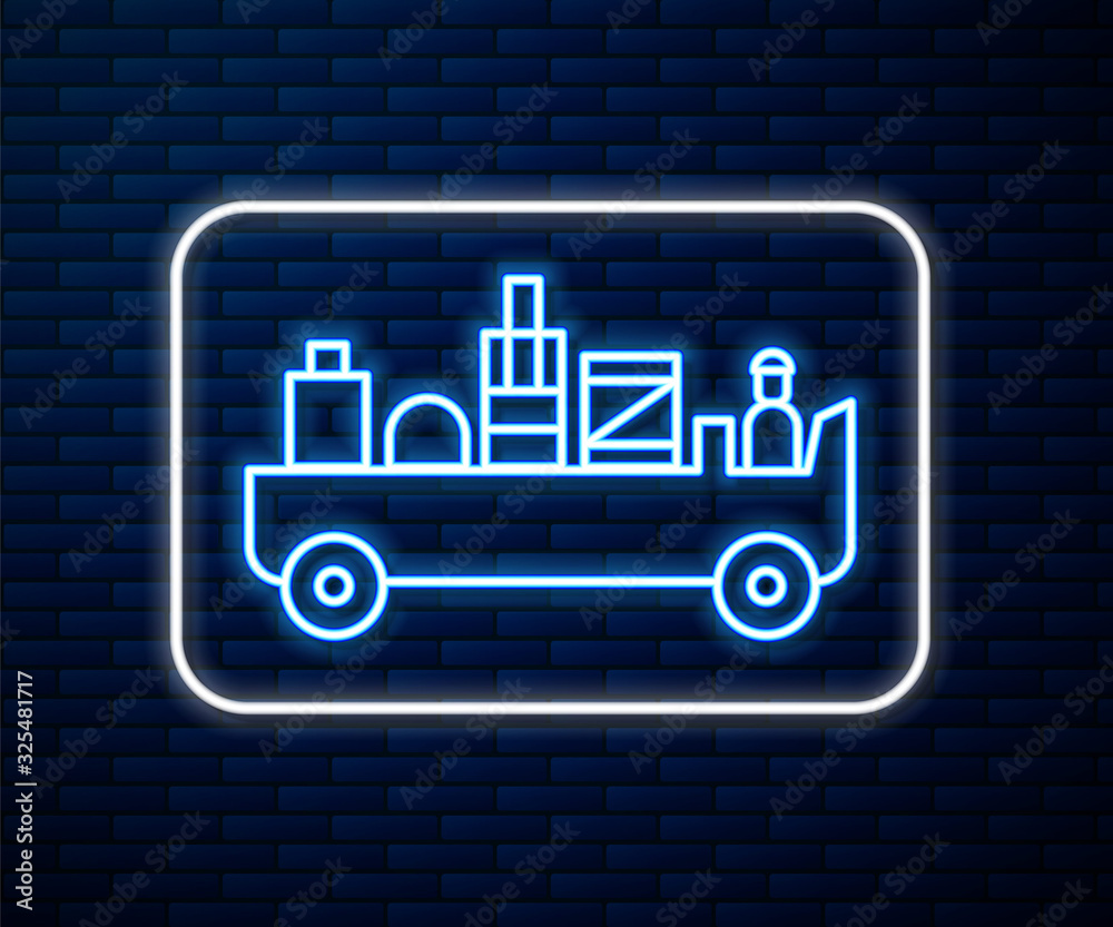 Glowing neon line Airport luggage towing truck icon isolated on brick wall background. Airport lugga