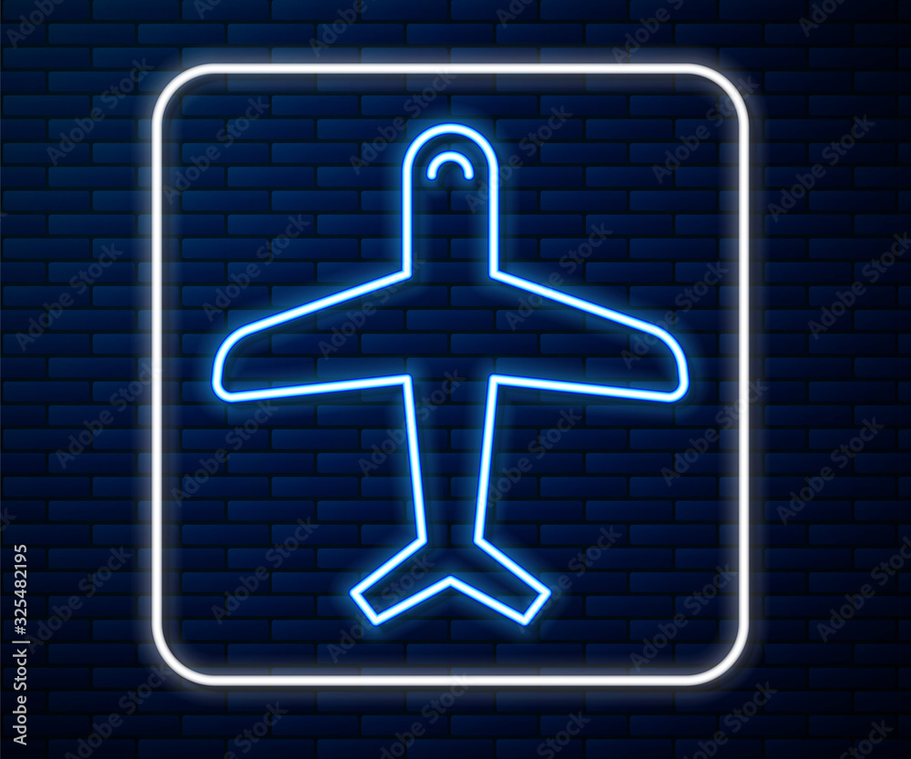 Glowing neon line Plane icon isolated on brick wall background. Flying airplane icon. Airliner sign.