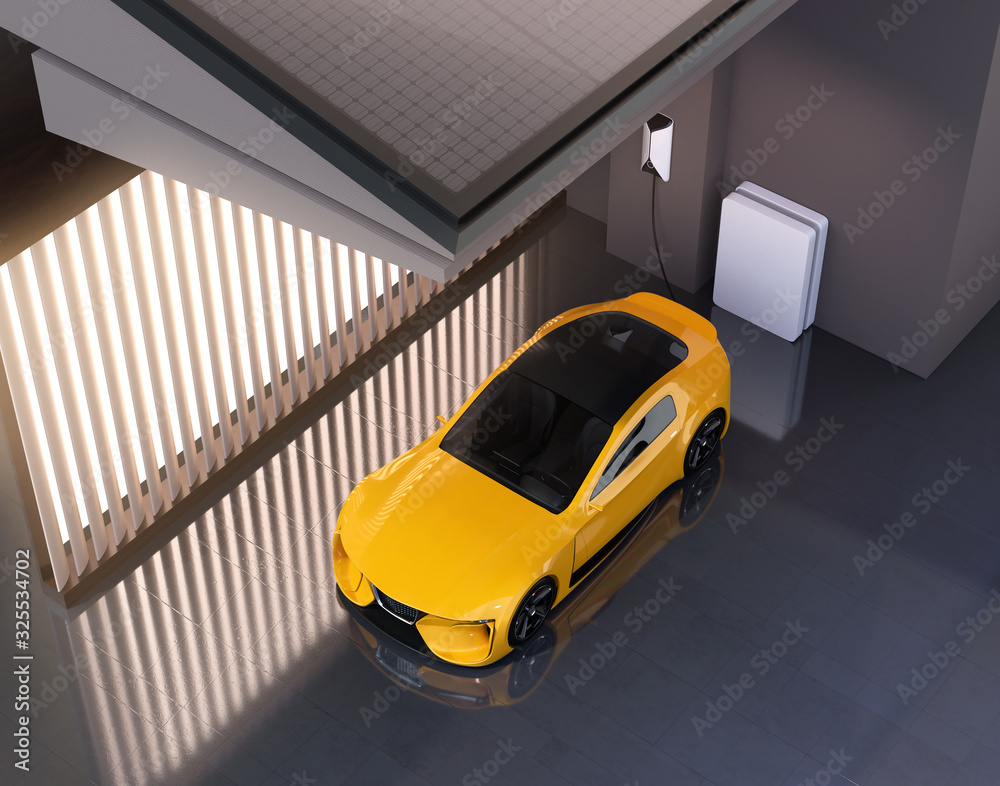 Electric sports car connect to power supply at home. Solar panels mounted on the roof. Sustainable l