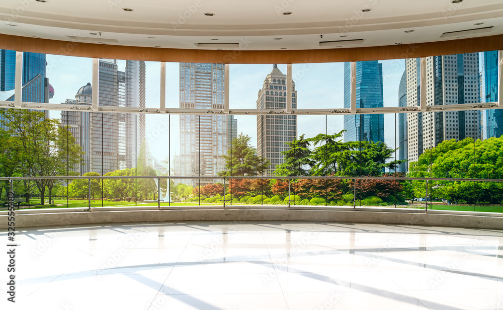 Office building glass and city skyline