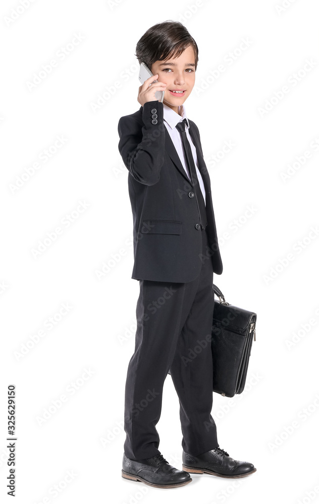 Little businessman talking by mobile phone on white background