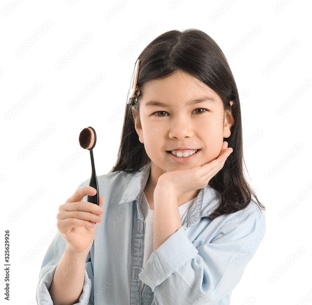 Cute little makeup artist on white background