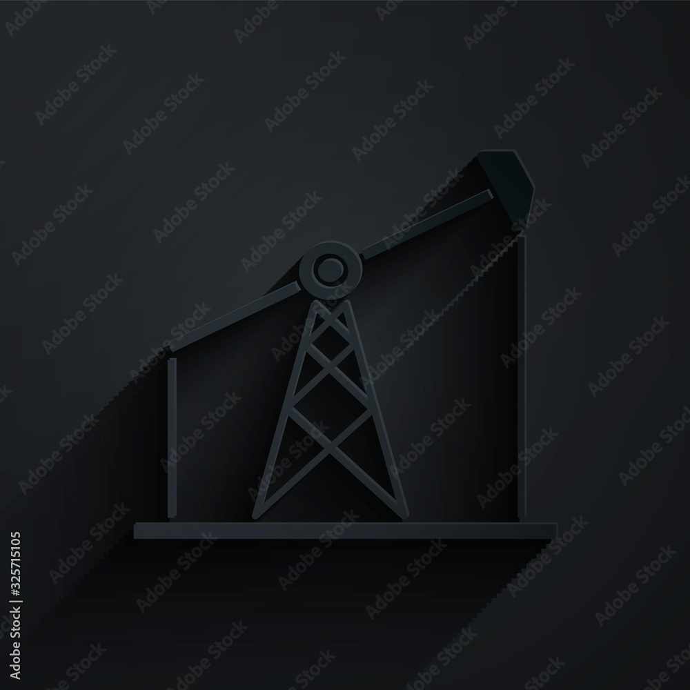 Paper cut Oil pump or pump jack icon isolated on black background. Oil rig. Paper art style. Vector 