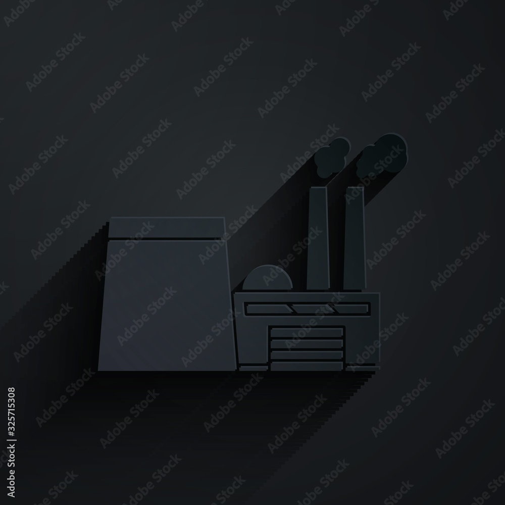 Paper cut Oil and gas industrial factory building icon isolated on black background. Paper art style