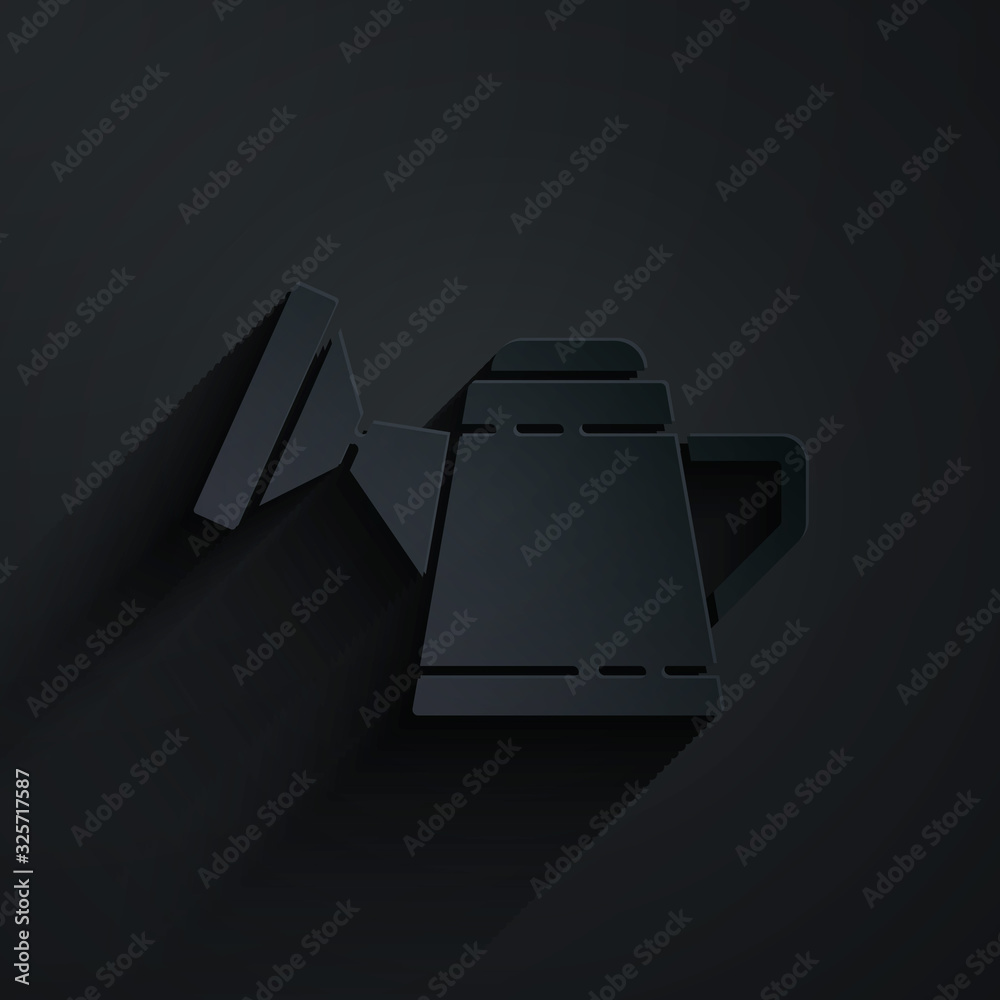 Paper cut Watering can icon isolated on black background. Irrigation symbol. Paper art style. Vector