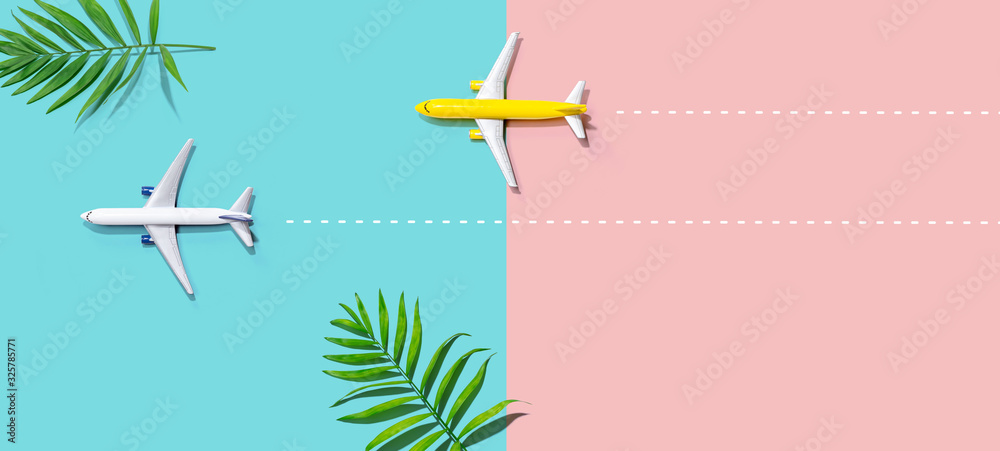 Flights booking and reservation theme with two miniature airplanes