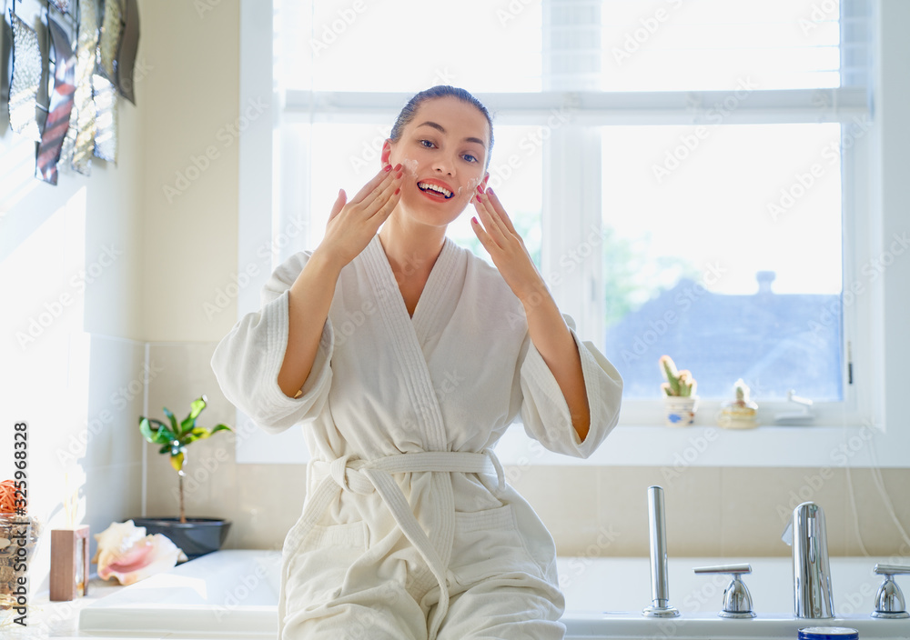 woman with cream for her face