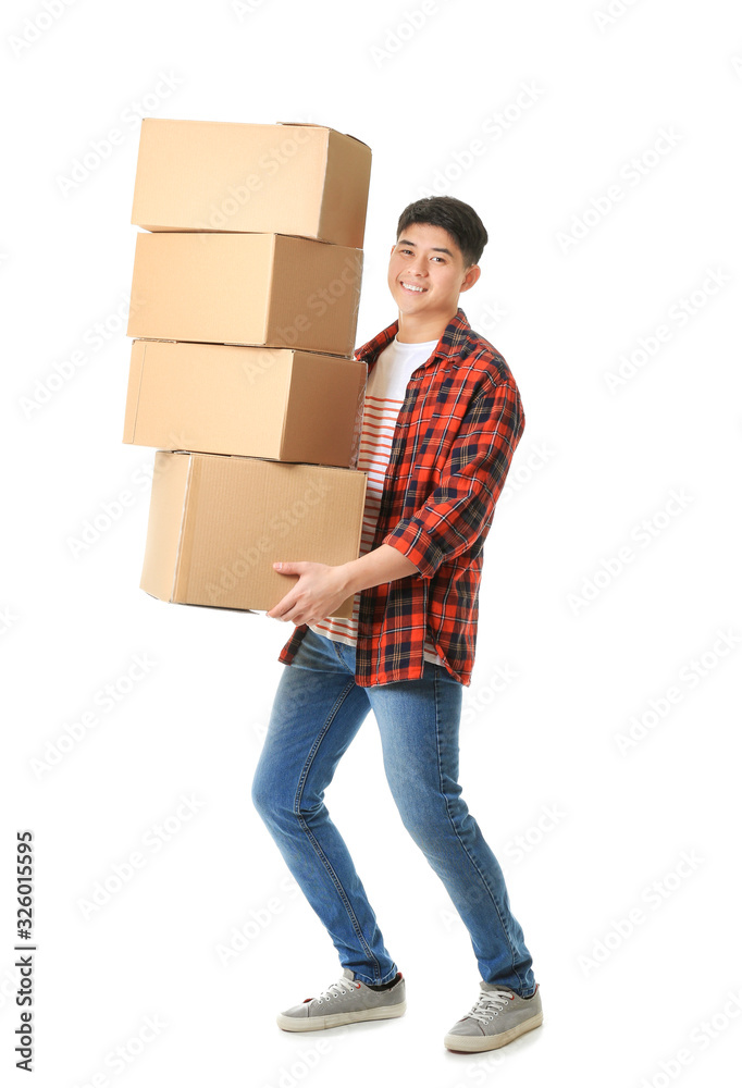 Asian man with moving boxes on white background