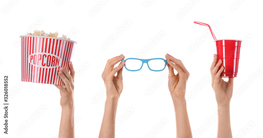 Many hands with popcorn, cup of drink and eyeglasses on white background