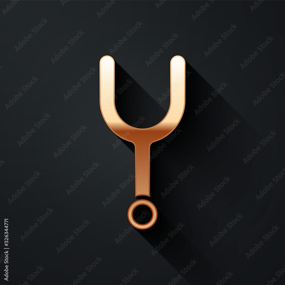 Gold Musical tuning fork for tuning musical instruments icon isolated on black background. Long shad