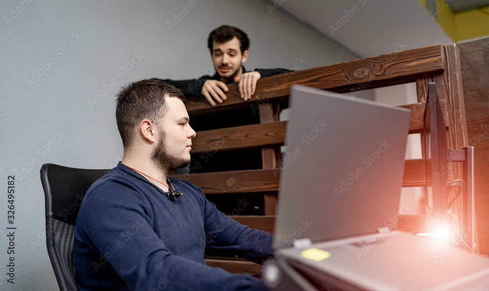 Two men working in a modern office. Achieving the best results. Two confident young men are discussi