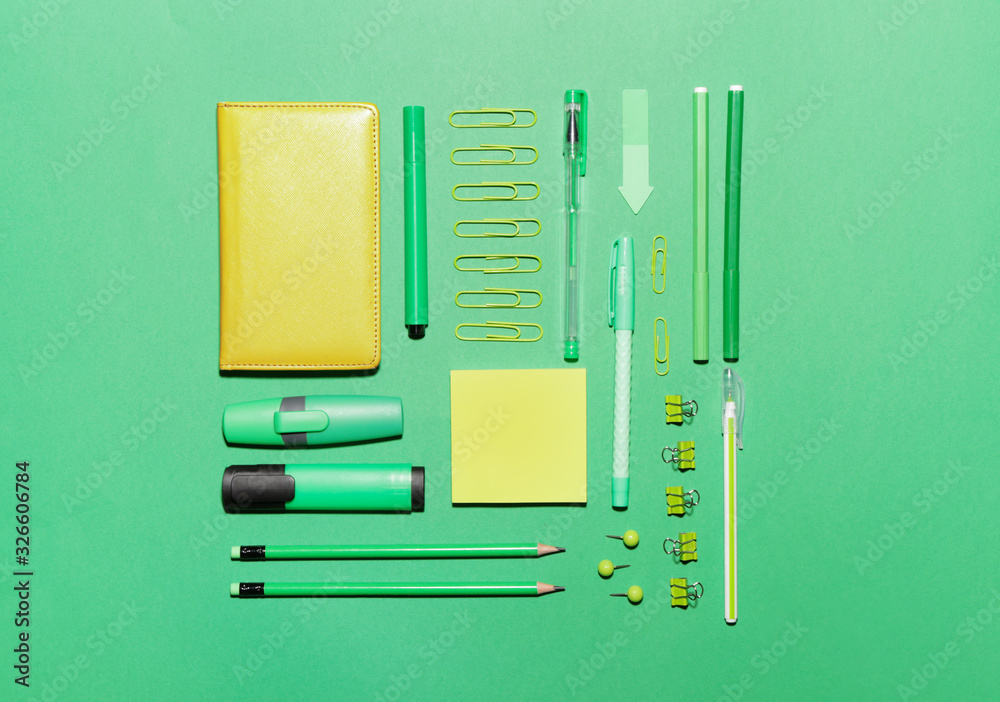 Set of school supplies on color background