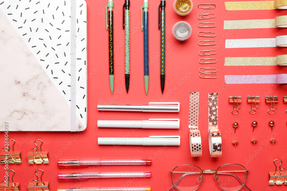 Set of school supplies on color background