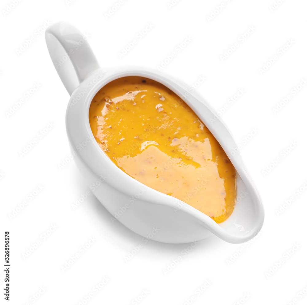 Gravy boat of tasty honey mustard sauce on white background