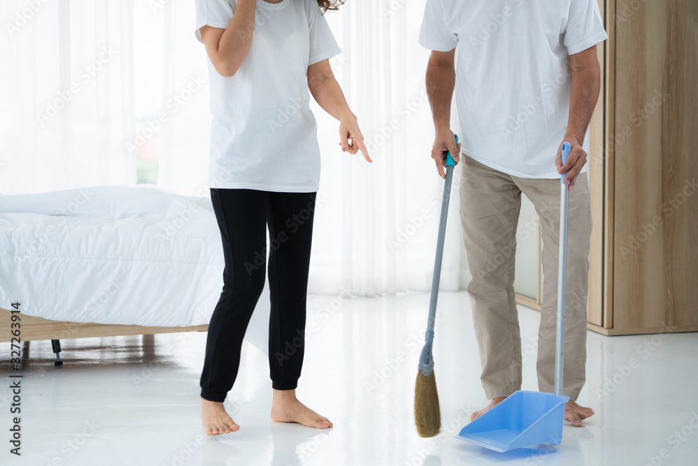 Asian senior couple cleaning bedroom floor. Retirement and healthy elderly concept.