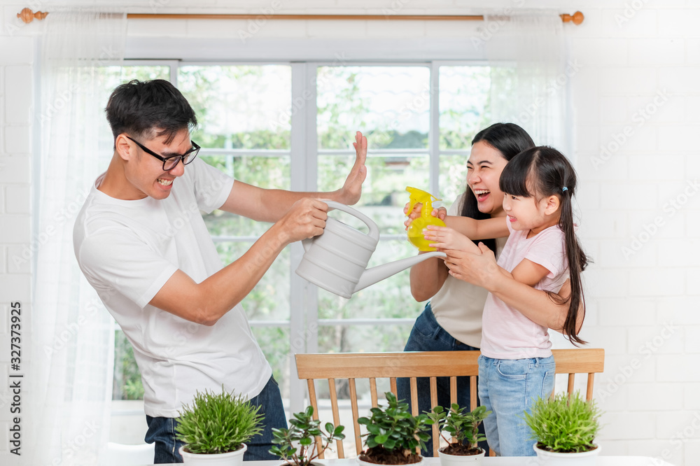 Happy Asian family playing together at home, lifestyle concept