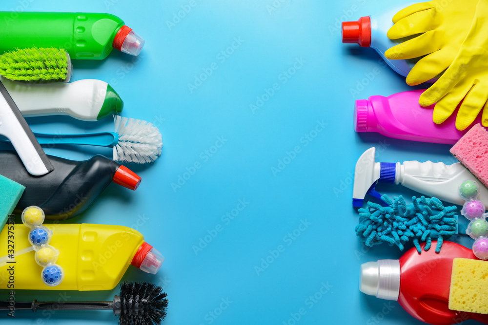 Set of cleaning supplies on color background