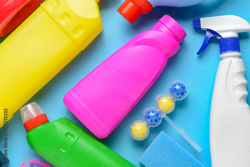 Set of cleaning supplies on color background