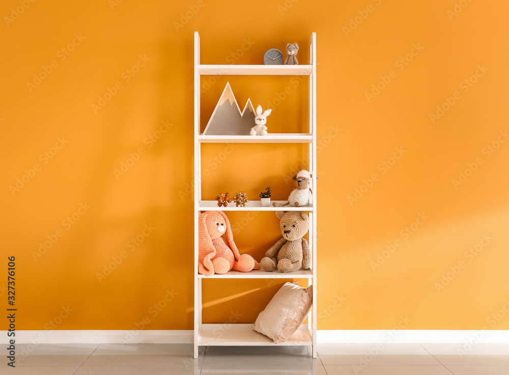 Modern shelf unit near color wall