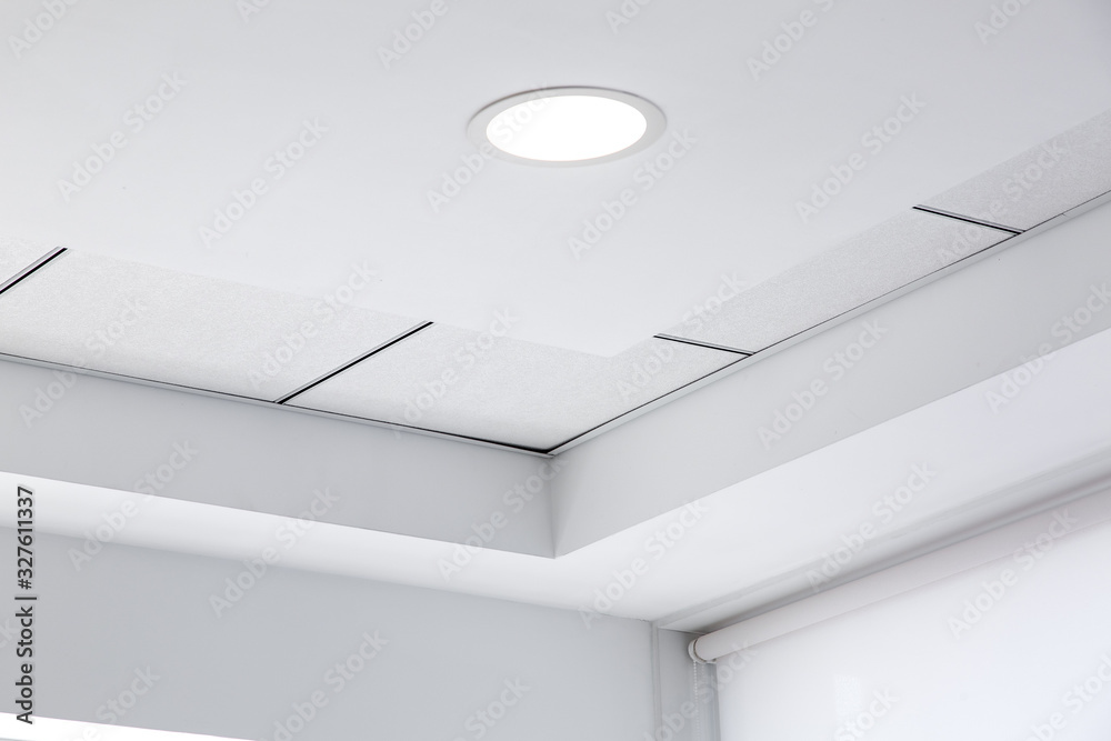 multi-level ceiling with three-dimensional protrusions and a suspended tiled ceiling with a built-in