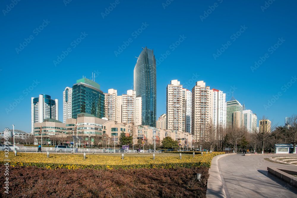 Qingdao city skyline and square floor tile building landscape..