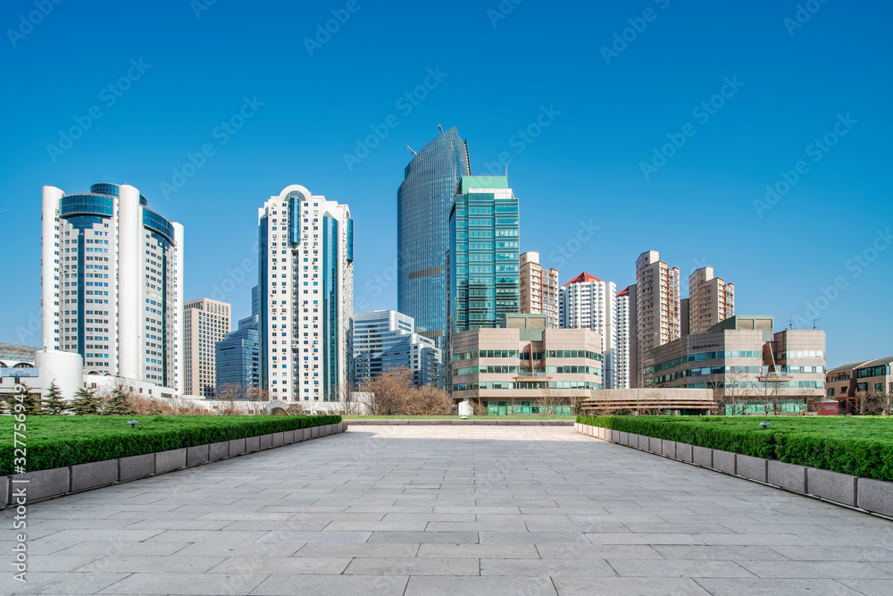 Qingdao city skyline and square floor tile building landscape..