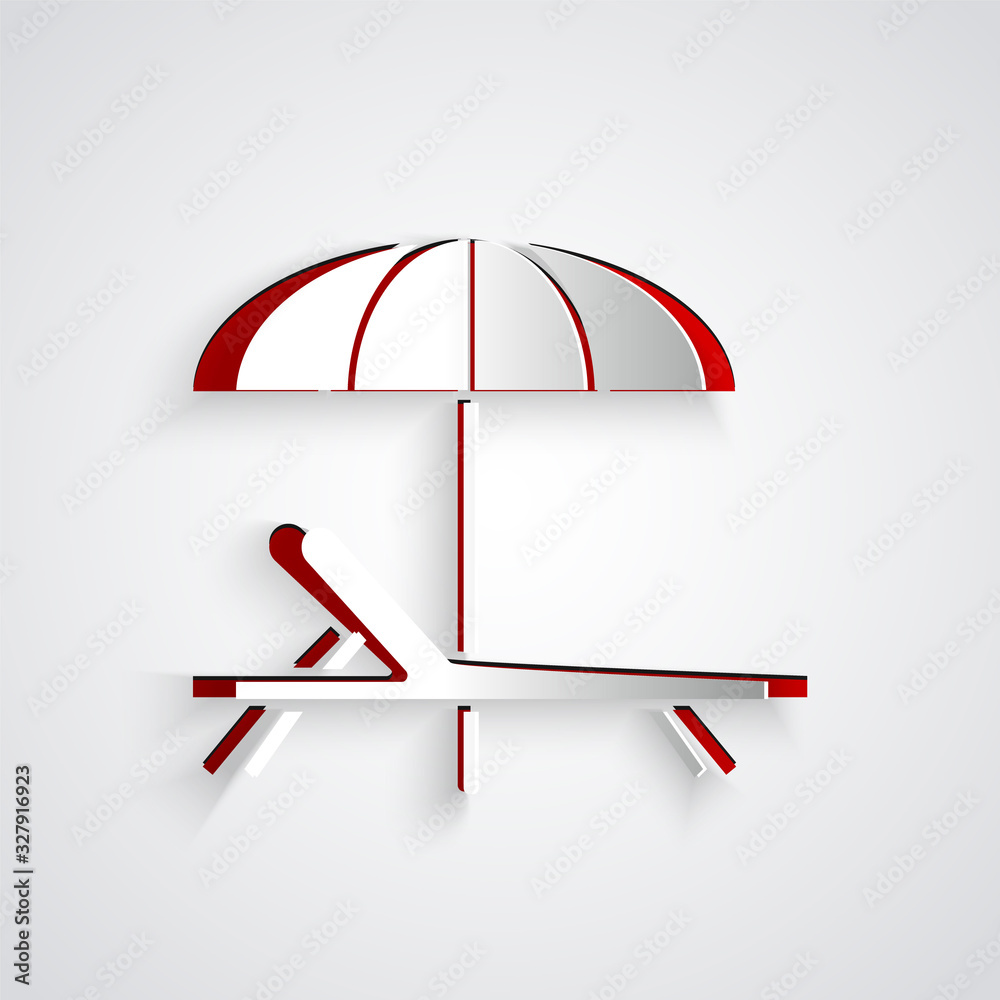 Paper cut Sunbed icon isolated on grey background. Beach umbrella and Sun lounger. Paper art style. 