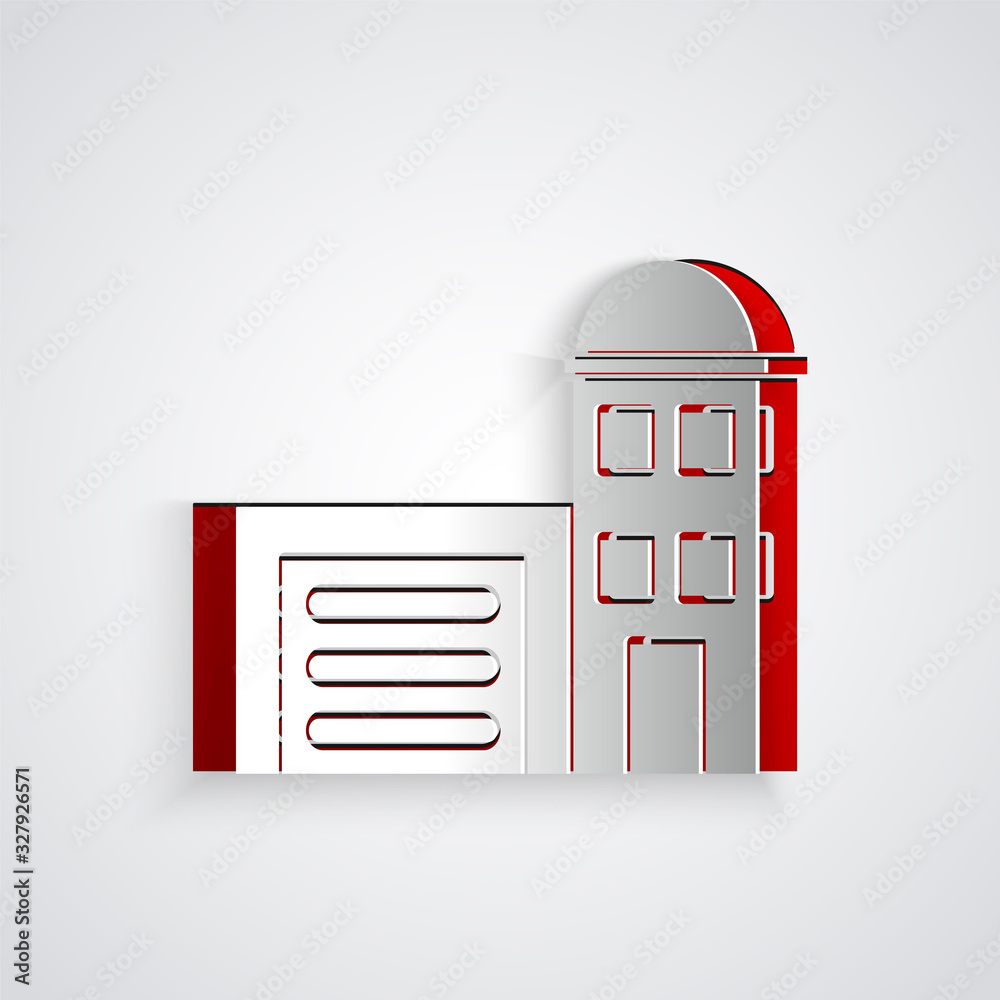 Paper cut Building of fire station icon isolated on grey background. Fire department building. Paper