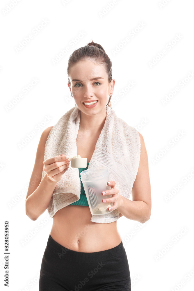 Sporty young woman with protein on white background