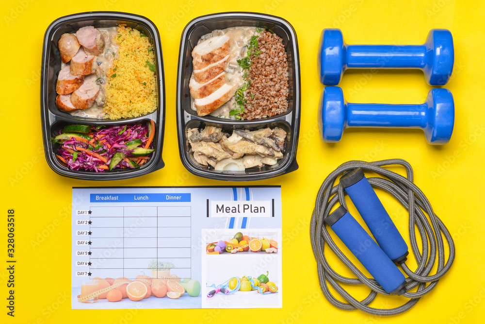 Containers with healthy food, sports equipment and meal plan on color background