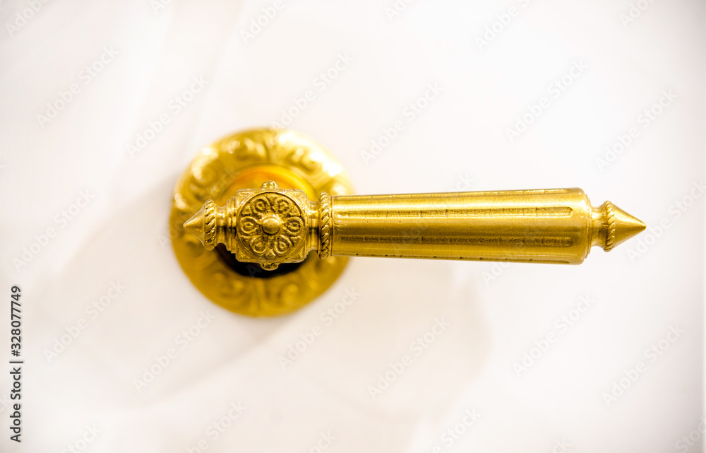 Metal door handle on a white background