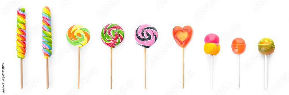 Different sweet lollipops on white background