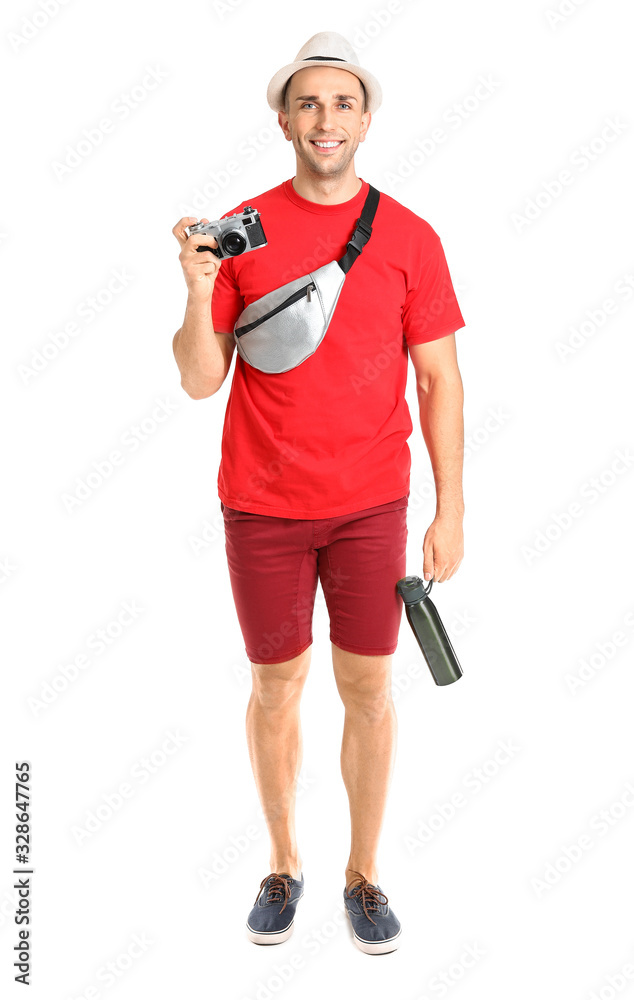 Male tourist with photo camera on white background