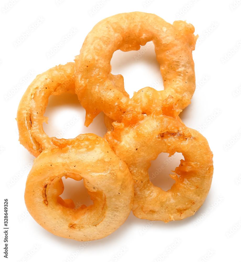 Crispy fried onion rings on white background