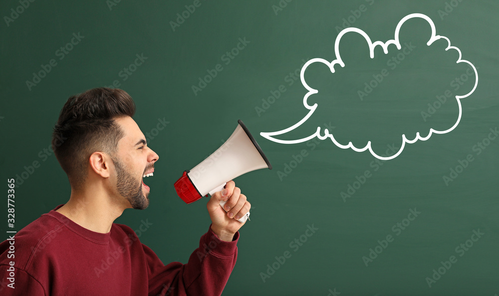 Man with megaphone and blank speech bubble on color background