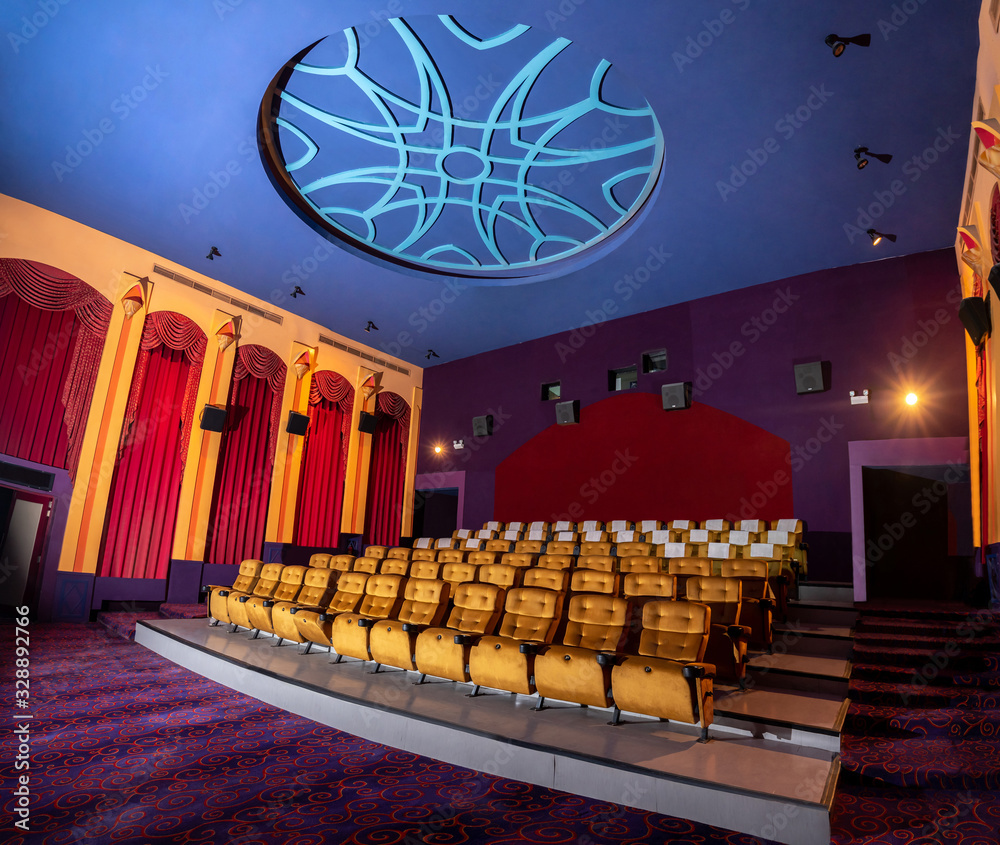 Large cinema theater interior with seat rows for audience to sit in movie theater premiere by cinema