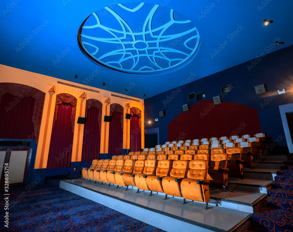 Large cinema theater interior with seat rows for audience to sit in movie theater premiere by cinema