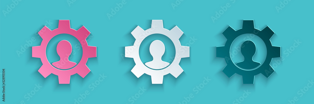 Paper cut Human with gear inside icon isolated on blue background. Artificial intelligence. Thinking