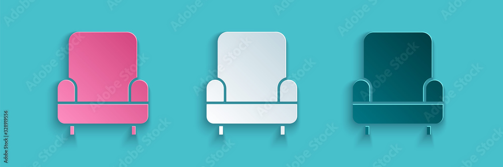 Paper cut Armchair icon isolated on blue background. Paper art style. Vector Illustration