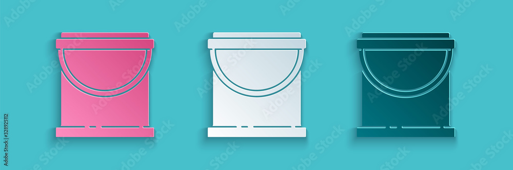 Paper cut Paint bucket icon isolated on blue background. Paper art style. Vector Illustration