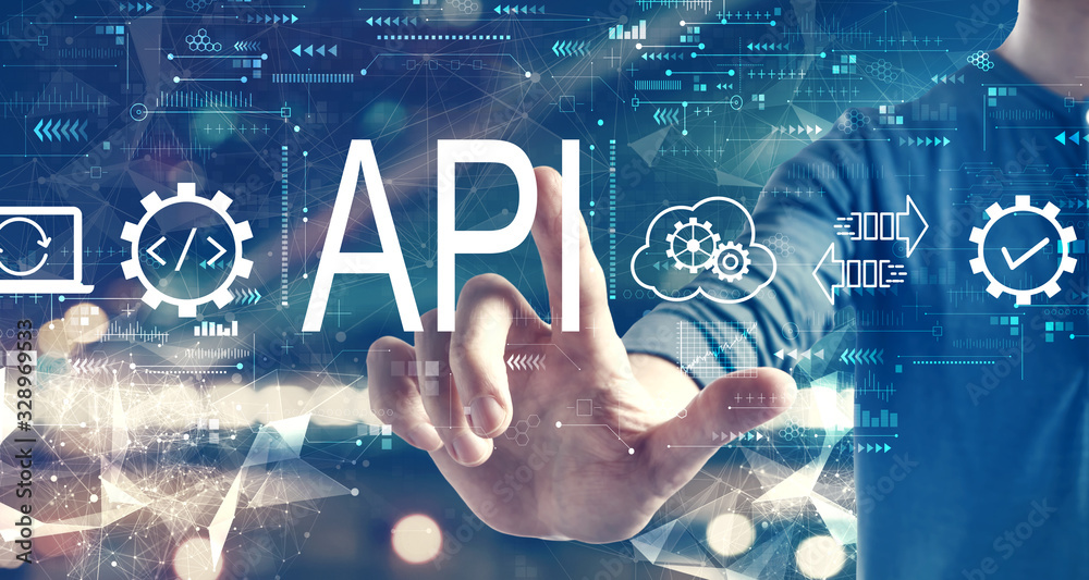 API - application programming interface concept with a man on blurred city background