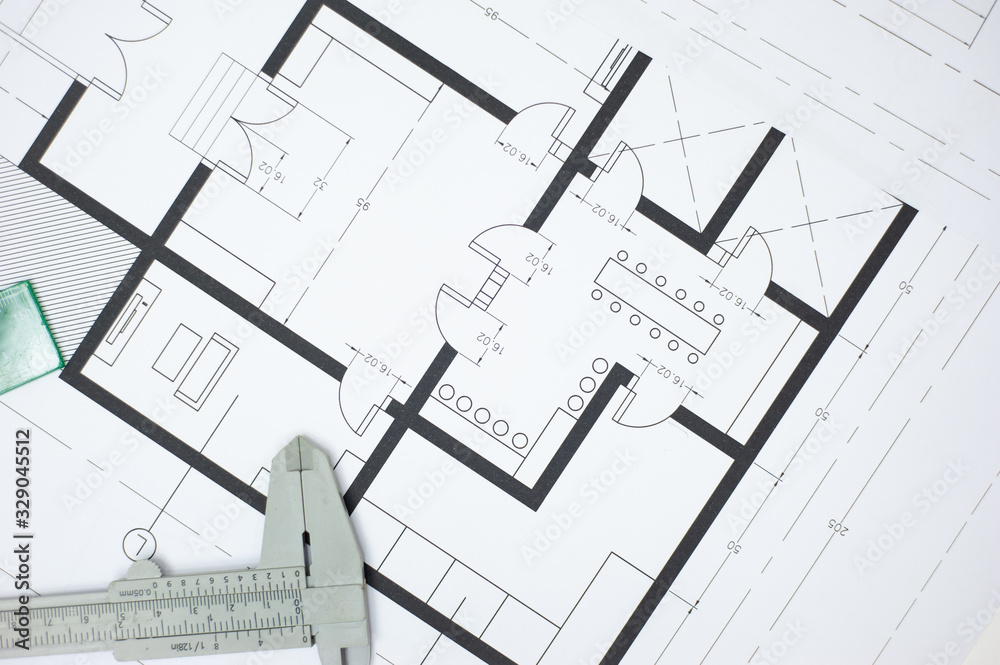 建筑师蓝图和室内规划上的建筑项目设计特写。