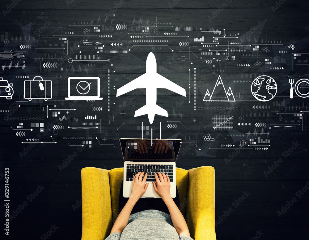 Flight ticket booking concept with person using a laptop in a chair