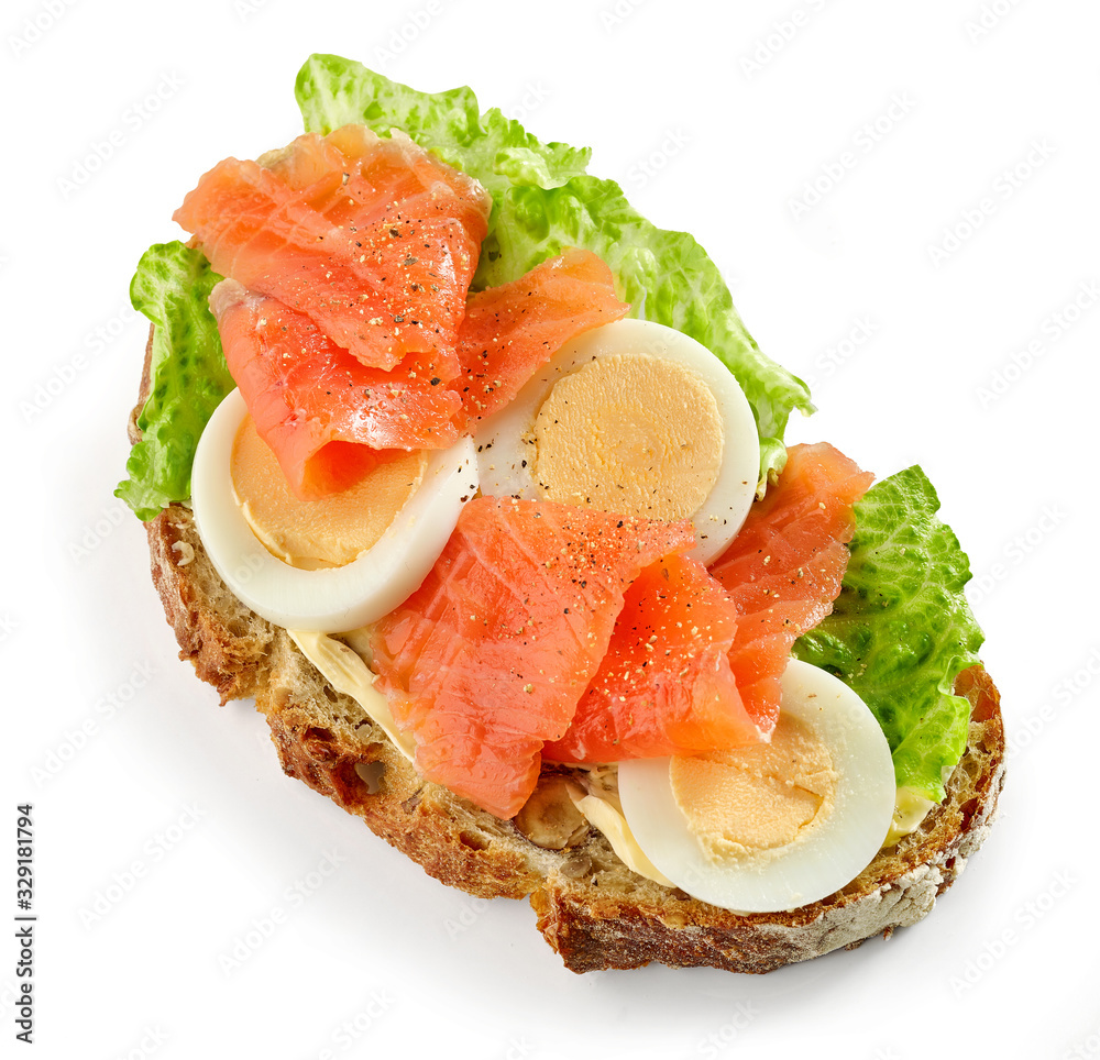 slice of bread with egg and salmon