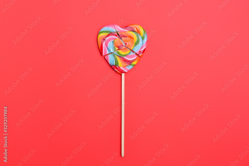 Crushed lollipop on color background