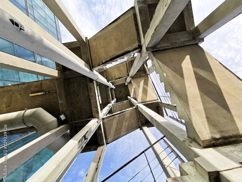 Bottom shot to fire stair tower building . Perspective with cement and loft constructure