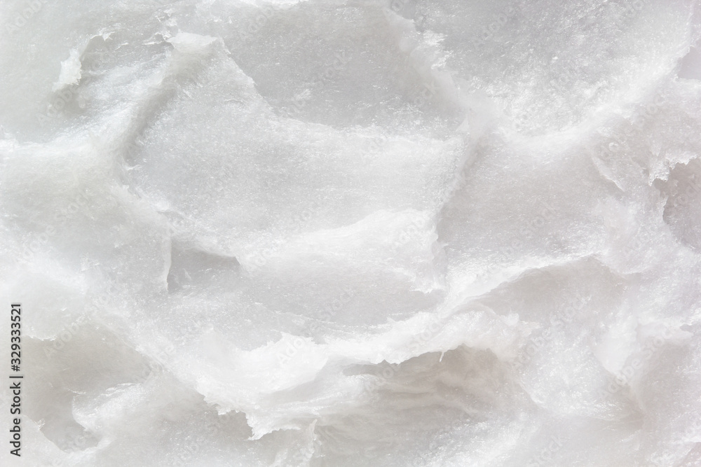 Coconut oil texture. Food ingredient, healthy fat. White coconut butter closeup background