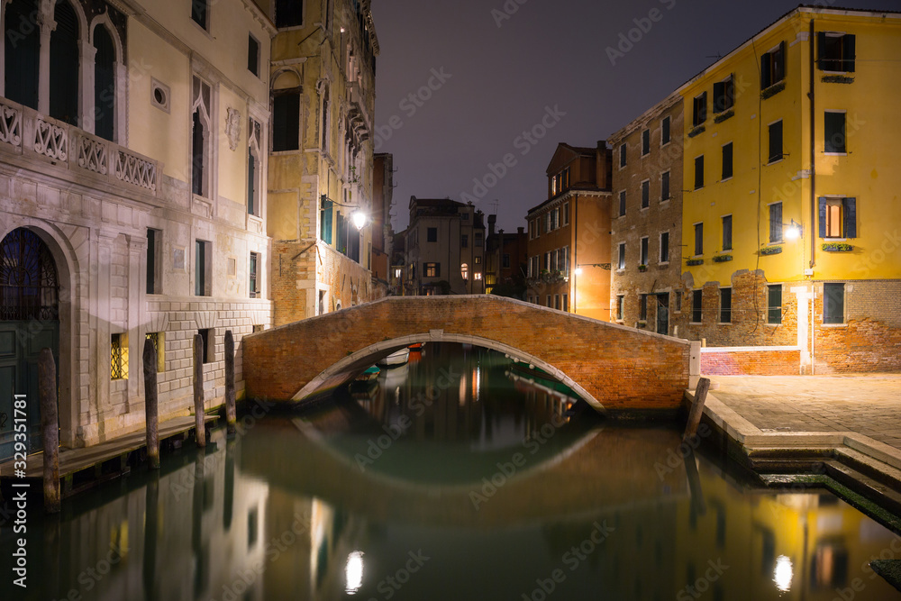 Canals of Venice city with beautiful architecture at night, Italy